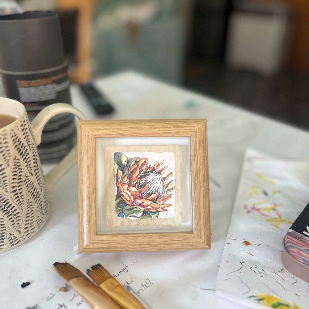 Original painted protea art on a recycled teabag in a wooden frame